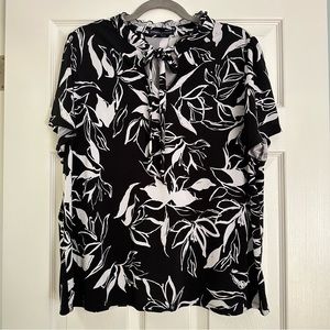 2X black short-sleeve blouse with white florals, tie neck